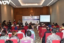 Lors du colloque intitulé « Renforcer les liens commerciaux Vietnam — Indonésie ». Photo: VOV