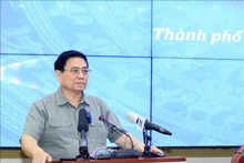 Le Premier ministre Pham Minh Chinh prend la parole lors de la réunion. Photo: VNA