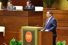 Le Premier ministre Pham Minh Chinh prononce un discours dans le cadre de la 8e session en cours de la 15e Assemblée nationale (AN), le 12 novembre. Photo: VNA