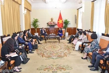 Panorama de la rencontre. Photo : baoquocte.vn