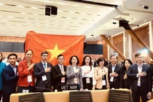 La délégation vietnamienne lors de la 46e session du Comité du patrimoine mondial. Photo : VNA