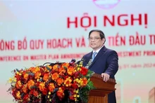 Le Premier ministre Pham Minh Chinh s'adresse à la conférence sur l’annonce du plan directeur et la promotion des investissements de la province de Hai Duong. Photo : VNA. 