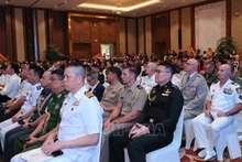 Des attachés militaires participent à l'événement. Photo : VNA.