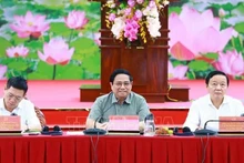 Le Premier ministre Pham Minh Chinh lors de la conférence. Photo : VNA.