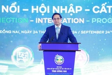 Le Premier ministre Pham Minh Chinh lors de la conférence d’annonce du plan directeur de la province de Dông Nai pour la période 2021-2030, avec une vision jusqu’en 2050 et de promotion des investissements, à Dông Nai, le 24 septembre. Photo : VNA.