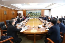 Vue générale de la séance de travail entre le ministre vietnamien du Plan et de l'Investissement, Nguyên Chi Dung, et la Commission nationale pour la réforme et le développement de Chine (NDRC), le 28 mars à Pékin. Photo : NDEL.