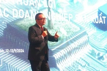 Lam Quang Nam, vice-président de VINASA et également président de la société SSG Management Solutions, prend la parole lors du séminaire. Photo: NDEL.