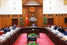 Le Premier ministre Pham Minh Chinh (centre) présidant la conférence du Comité du Parti du gouvernement, à Hanoi, le 5 mars. Photo: VNA 