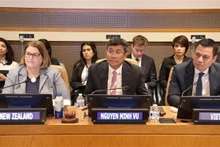 Le vice-ministre permanent des Affaires étrangères, Nguyen Minh Vu (au milieu), au séminaire. Photo : VNA.