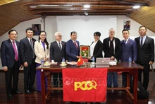 Rencontre avec des responsables du Parti communiste de Colombie. Photo : VNA.