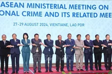 Les délégués de la 18e réunion ministérielle de l’ASEAN sur la prévention et la lutte contre la criminalité transnationale (AMMTC 18), le 28 août à Vientiane. Photo : VNA.