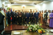 Les délégués à l’événement posent pour une photo de groupe. Photo : VNA.