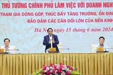 Le Premier ministre Pham Minh Chinh à la conférence avec les entreprises publiques. Photo : VNA.