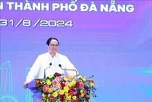 Le Premier ministre Pham Minh Chinh lors de la conférence. Photo : VNA.