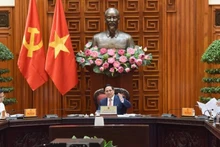 Le Premier ministre Pham Minh Chinh lors de la réunion. Photo : NDEL. 