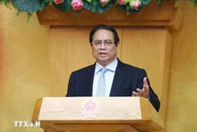 Le Premier ministre Pham Minh Chinh lors de la réunion. Photo: VNA 