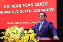 Le Premier ministre Pham Minh Chinh prend la parole lors de la Conférence national sur l'éducation aux droits de l'homme tenue le 11 décembre. Photo : VNA.