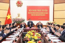 La conférence en ligne sur le projet de construction d'une ligne d'électricité de 500 kV dans la province de Thanh Hoa. Photo : VNA.