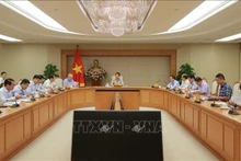 Lors de la réunion sur le rapport du Projet de création du marché du carbone, le 12 juillet à Hanoi. Photo: VNA.