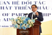 Le PM vietnamien Pham Minh Chinh, lors de la cérémonie de fêter le 30e anniversaire du partenariat Vietnam - BAD, le 13 mars à Hanoi. Photo : NDEL.