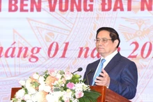Le Premier ministre vietnamien, Pham Minh Chinh, s'exprime lors de la conférence. Photo : Trân Hai/NDEL.