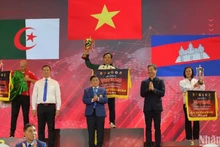Le Vietnam termine au premier rang lors du 7e Championnat du monde de Vovinam, suivi par l'Algérie et le Cambodge. Photo: NDEL.