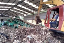 Modèle de traitement des déchets utilisant la technologie microbiologique sans provoquer de pollution environnementale à Thanh Hoa. Photo : VNA.