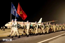 L'équipe du génie N°1 de retour à l'aéroport international de Noi Bai, après avoir accompli sa mission à Abyei. Photo : VNA.