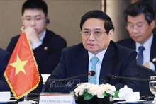 Le Premier ministre Pham Minh Chinh au petit-déjeuner-débat avec des dirigeants de grandes entreprises sud-coréennes. Photo : VNA.