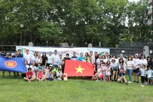 Les membres de l'équipe vietnamienne participant à la course d'amitié « ASEAN Fun Run ». Photo : thoidai.com.vn