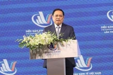 Le Premier ministre Pham Minh Chinh s'exprime lors du 4e Forum économique du Vietnam 2022 à Hô Chi Minh-Ville. Photo : nhandan.vn