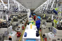 La chaîne de production de chaussettes de la sarl Jasan Vietnam, investie par la Chine, dans le Parc industriel VSIP Hai Phong. Photo d'archives : VNA.