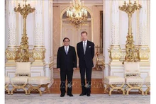 Le Premier ministre Pham Minh Chinh (gauche) et le Grand-Duc de Luxembourg, Henri. Photo : VNA