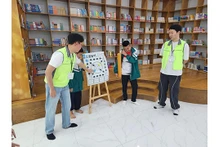 Des jeux lors de l'échange avec des étudiants de l’Université sud-coréenne de Gyeongsang. Photo: thoidai.com.vn