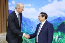 Le Premier ministre vietnamien Pham Minh Chinh (à droite) et Roland Busch, PDG du groupe allemand Siemens. Photo : VNA.