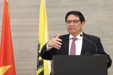 Le Premier ministre Pham Minh Chinh s'exprime lors de l'événement. Photo: VNA