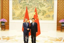 Tô Lâm (à gauche), ministre vietnamien de la Sécurité publique et Wang Xiaohong, ministre chinois de la Sécurité publique. Photo : VNA.