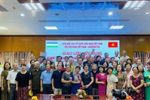 Des délégués lors de l'échange d'amitié. Photo: thoidai.com.vn