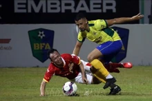 Le match amical au stade Hoa Xuan. Photo: VNA