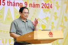 Le Premier ministre Pham Minh Chinh appelle à agir pour régler efficacement les conséquences du typhon Yagi et atteindre l'objectif de croissance. Photo : VNA.