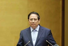 Le Premier ministre Pham Minh Chinh s’exprime lors de la visioconférence nationale du Politburo et du Secrétariat du Comité central du Parti. Photo : VNA. 
