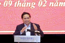 Le Premier ministre Pham Minh Chinh lors de la séance de travail avec les autorités de Da Nang. Photo : VNA.