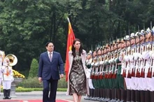Le Premier ministre Pham Minh Chinh et son homologue néo-zélandaise Jacinda Ardern, à Hanoi, le 14 novembre. Photo : VNA.