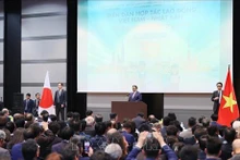 Le Premier ministre vietnamien, Pham Minh Chinh, au forum de coopération dans le travail Vietnam – Japon à Tokyo. Photo : VNA.