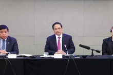 Le Premier ministre Pham Minh Chinh (au centre) prend la parole lors du séminaire à Wellington, le 11 mars. Photo : VNA.