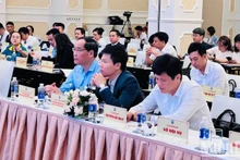 Les délégués à la conférence annuelle sur la coopération pour le développement du géoparc de Lang Son. Photo: NDEL
