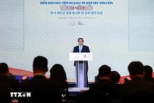 Le Premier ministre Pham Minh Chinh s'exprime lors du forum. Photo : VNA.