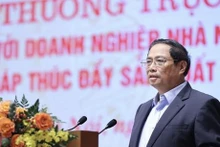 Le Premier ministre Pham Minh Chinh lors de la conférence. Photo : VNA.