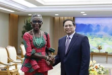 Le Premier ministre Pham Minh Chinh et la directrice générale adjointe du FMI, Antoinette Sayeh. Photo : VNA.