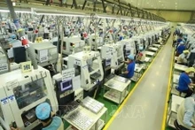 L'année dernière, malgré les impacts de la crise économique mondiale et les difficultés intérieures, le Vietnam a toujours été un point positif avec une croissance du PIB de 5,05%. Photo : VNA.